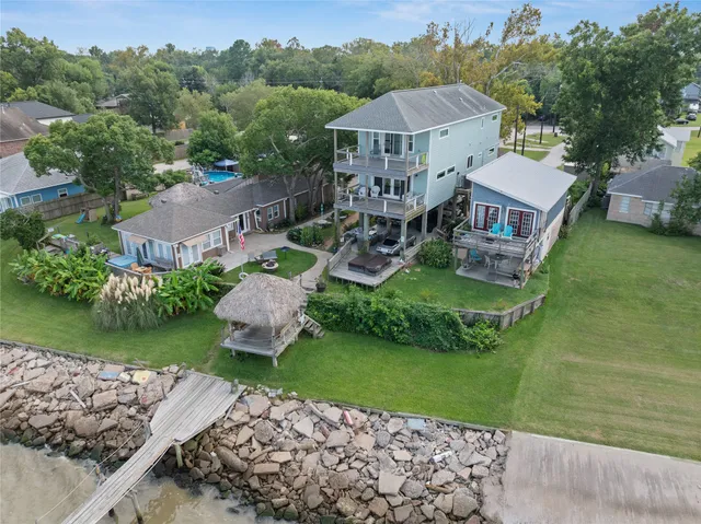 an aerial view of a house with a garden