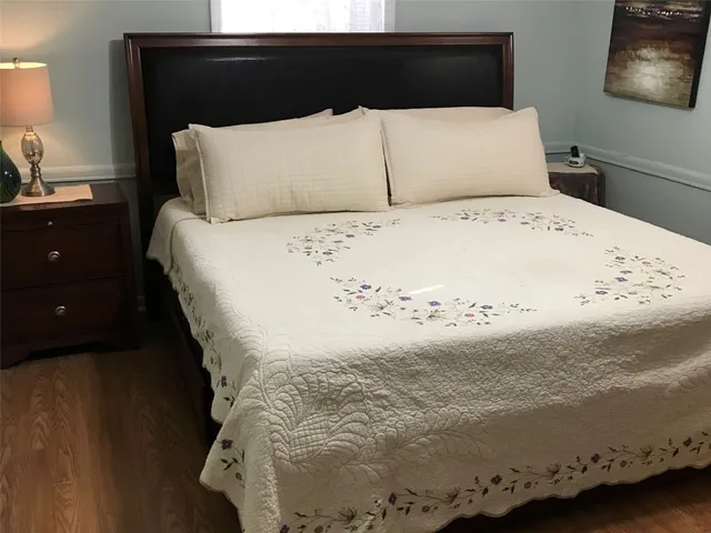 a kitchen with stainless steel appliances granite countertop a stove sink and cabinets