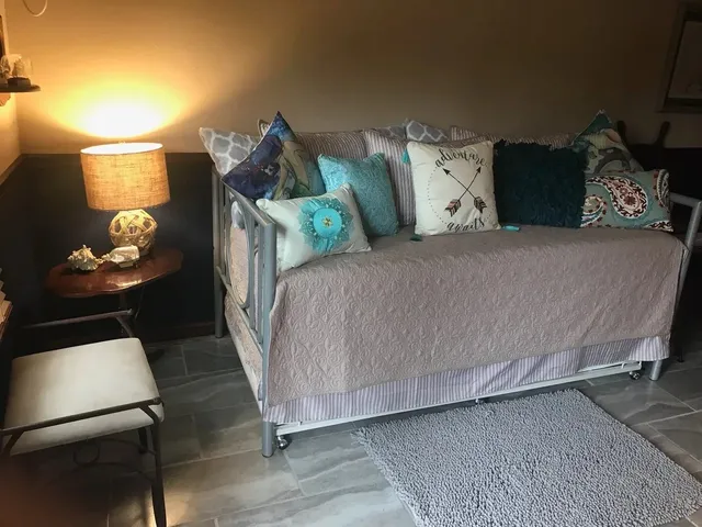 a room with furniture and washer