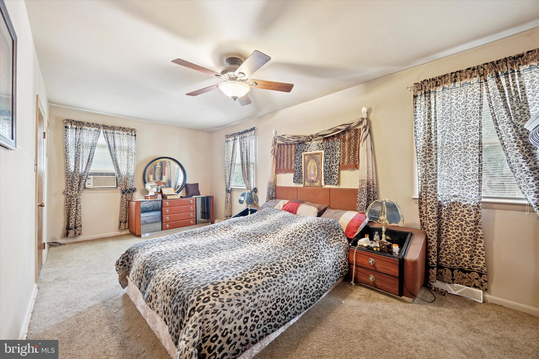 662 South Oak Avenue Secane, PA 19018 - Photo 19 of 39 a bedroom with a bed couch and a window