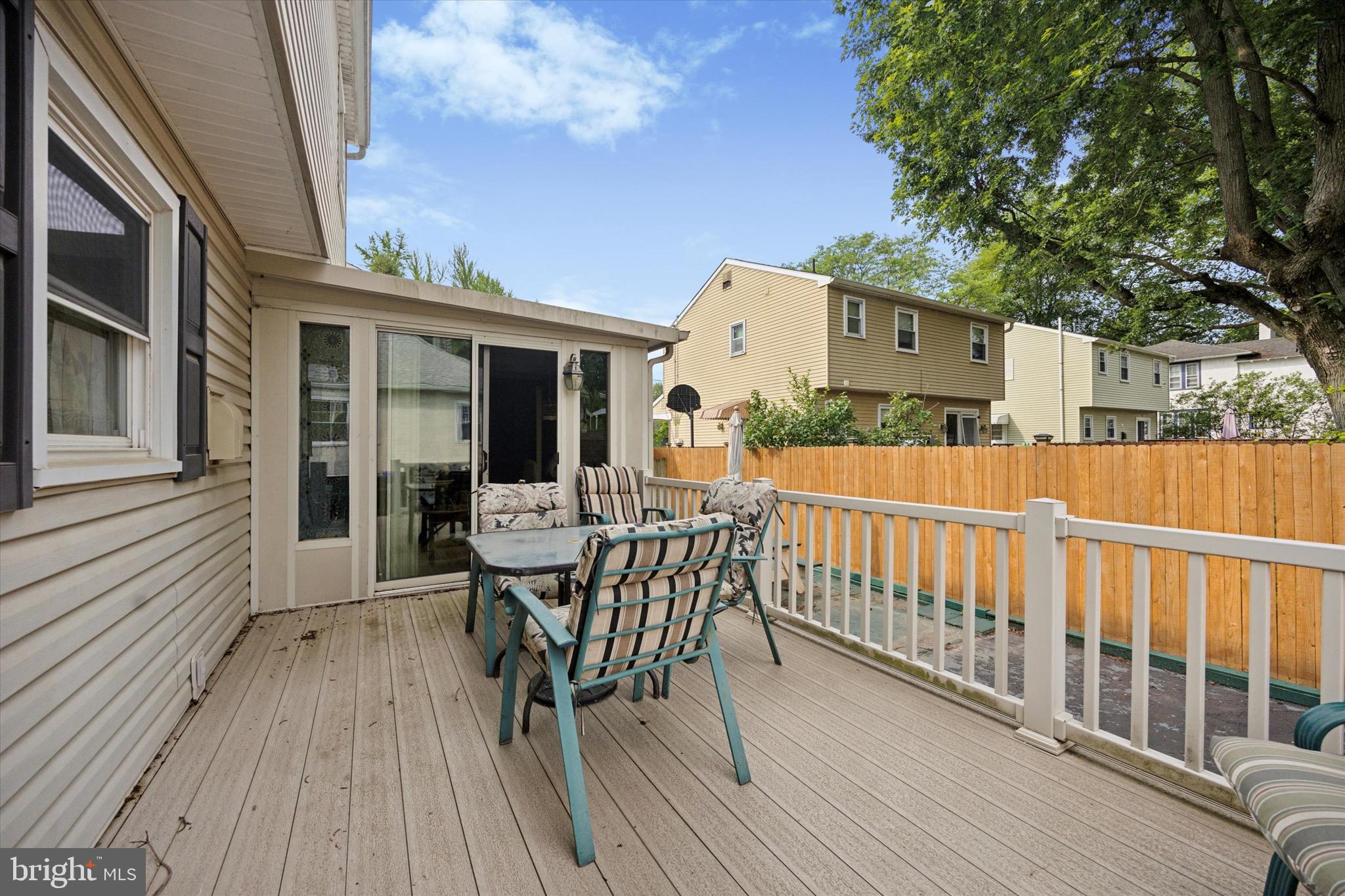 662 South Oak Avenue Secane, PA 19018 - Photo 33 of 39 a view of a deck with table and chairs and wooden floor