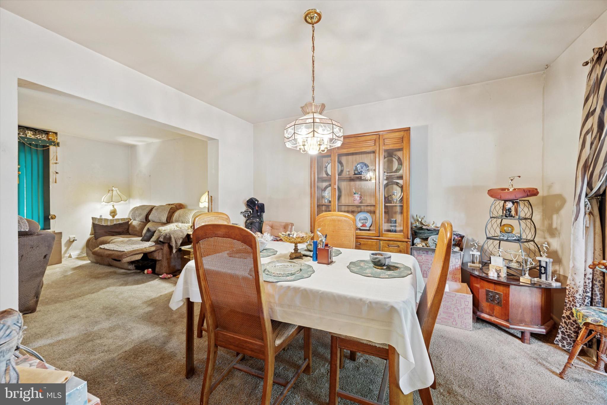 662 South Oak Avenue Secane, PA 19018 - Photo 10 of 39 a view of a dining room with furniture and chandelier