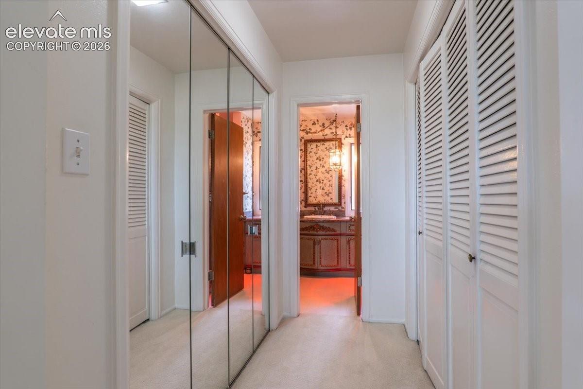 2735 Rigel Drive Colorado Springs, CO 80906 - Photo 19 of 48 Primary Bedroom Closet Area
