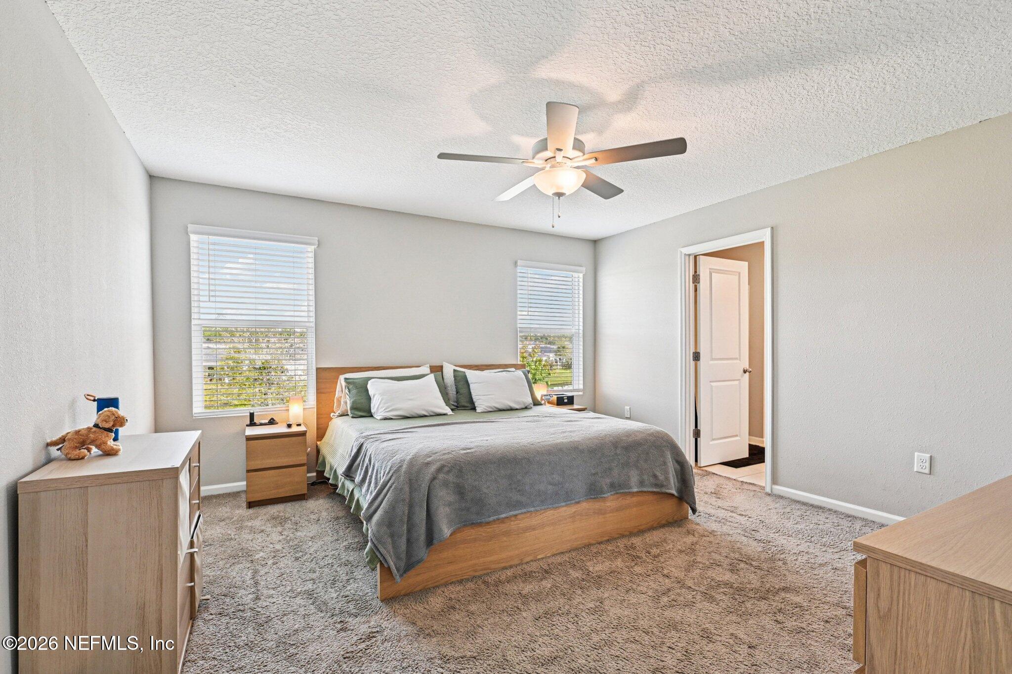 706 Meadow Ridge Drive St. Augustine, FL 32092 - Photo 24 of 67 Primary bedroom