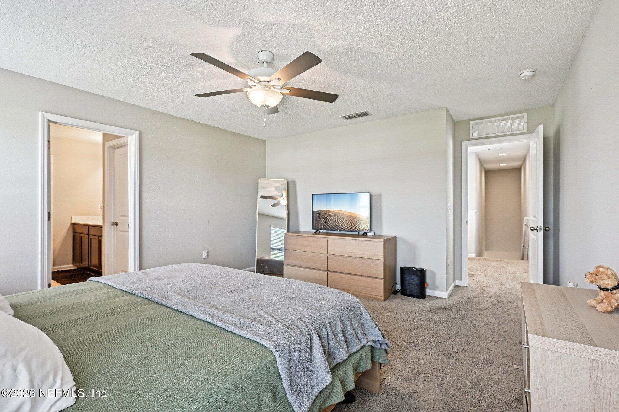 706 Meadow Ridge Drive St. Augustine, FL 32092 - Photo 26 of 67 Primary bedroom