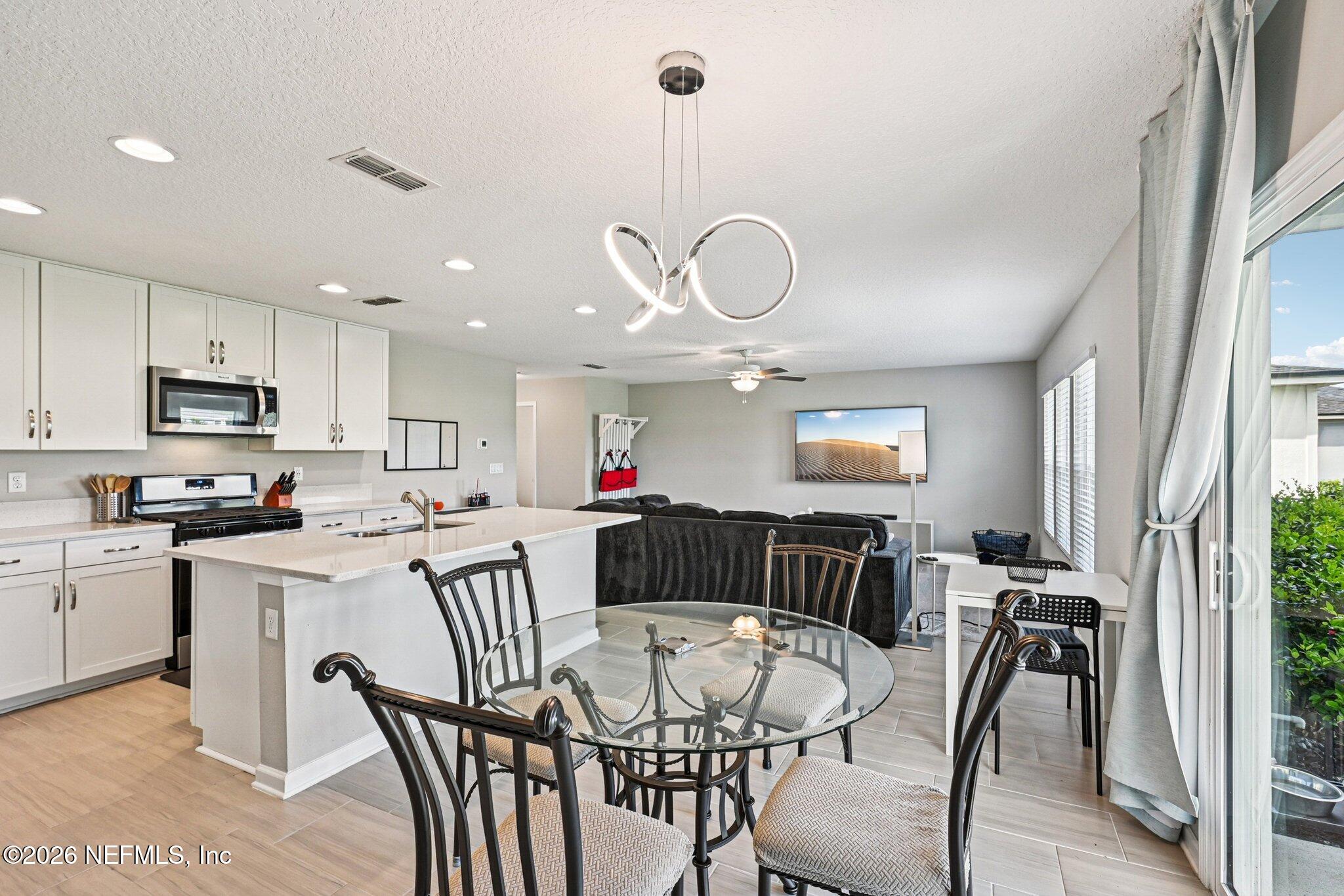 706 Meadow Ridge Drive St. Augustine, FL 32092 - Photo 4 of 67 Kitchen to family room