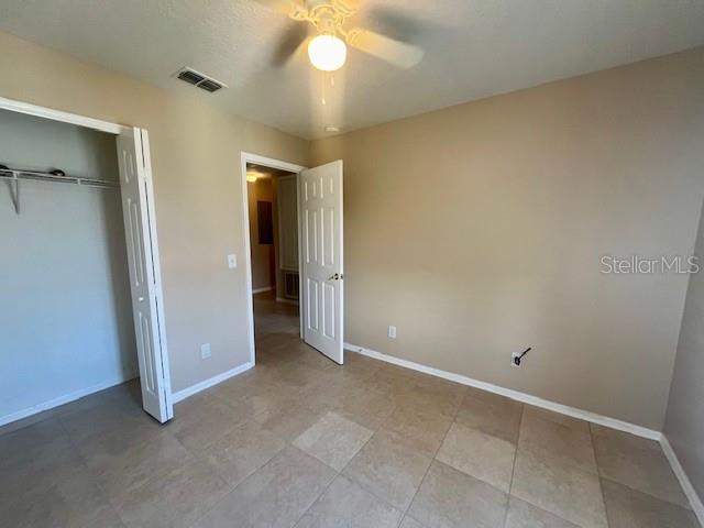 1268 Celebration Avenue Celebration, FL 34747 - Photo 13 of 25 an empty room with a bathroom