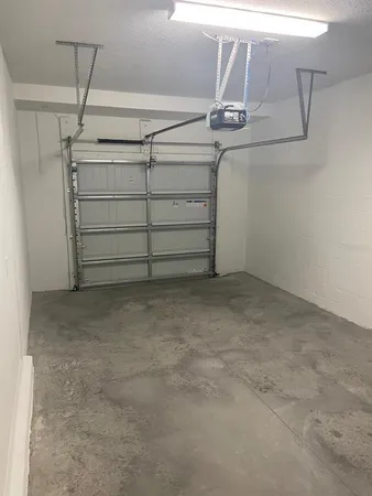 a view of a store room with racks on the wall