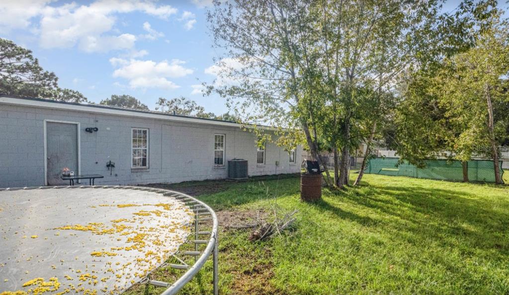 3818 Laso Way Orlando, FL 32822 - Photo 19 of 19 a view of a house with backyard