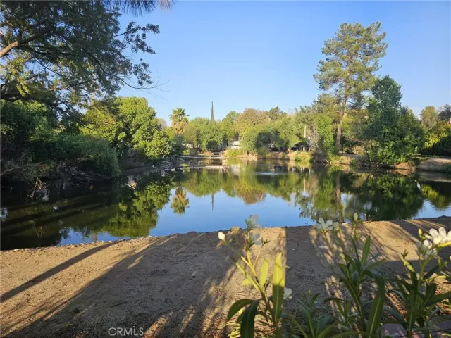 a view of living room with furniture and windows