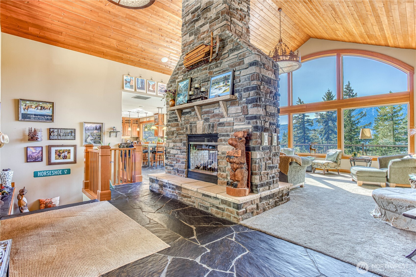 145 Lava Lane Ronald, WA 98940 - Photo 11 of 39 a living room with furniture and a floor to ceiling window