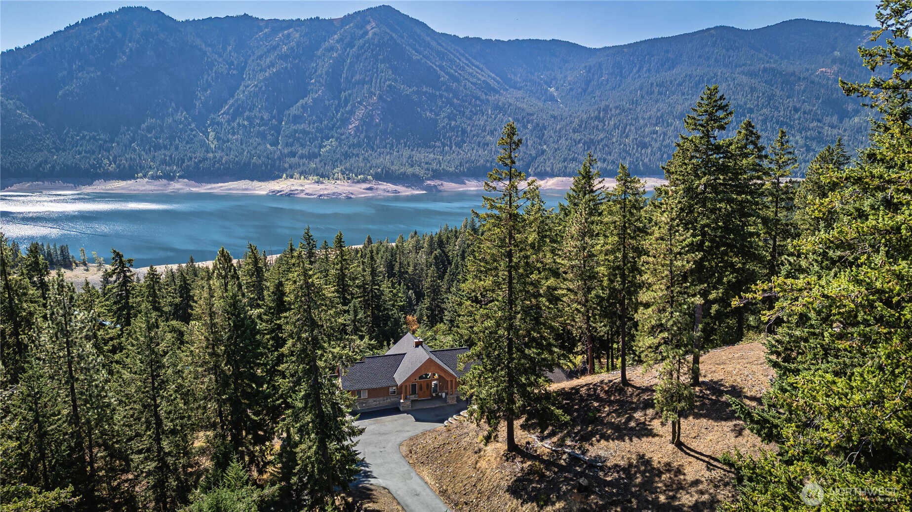145 Lava Lane Ronald, WA 98940 - Photo 2 of 39 a view of a lake in middle of the green field