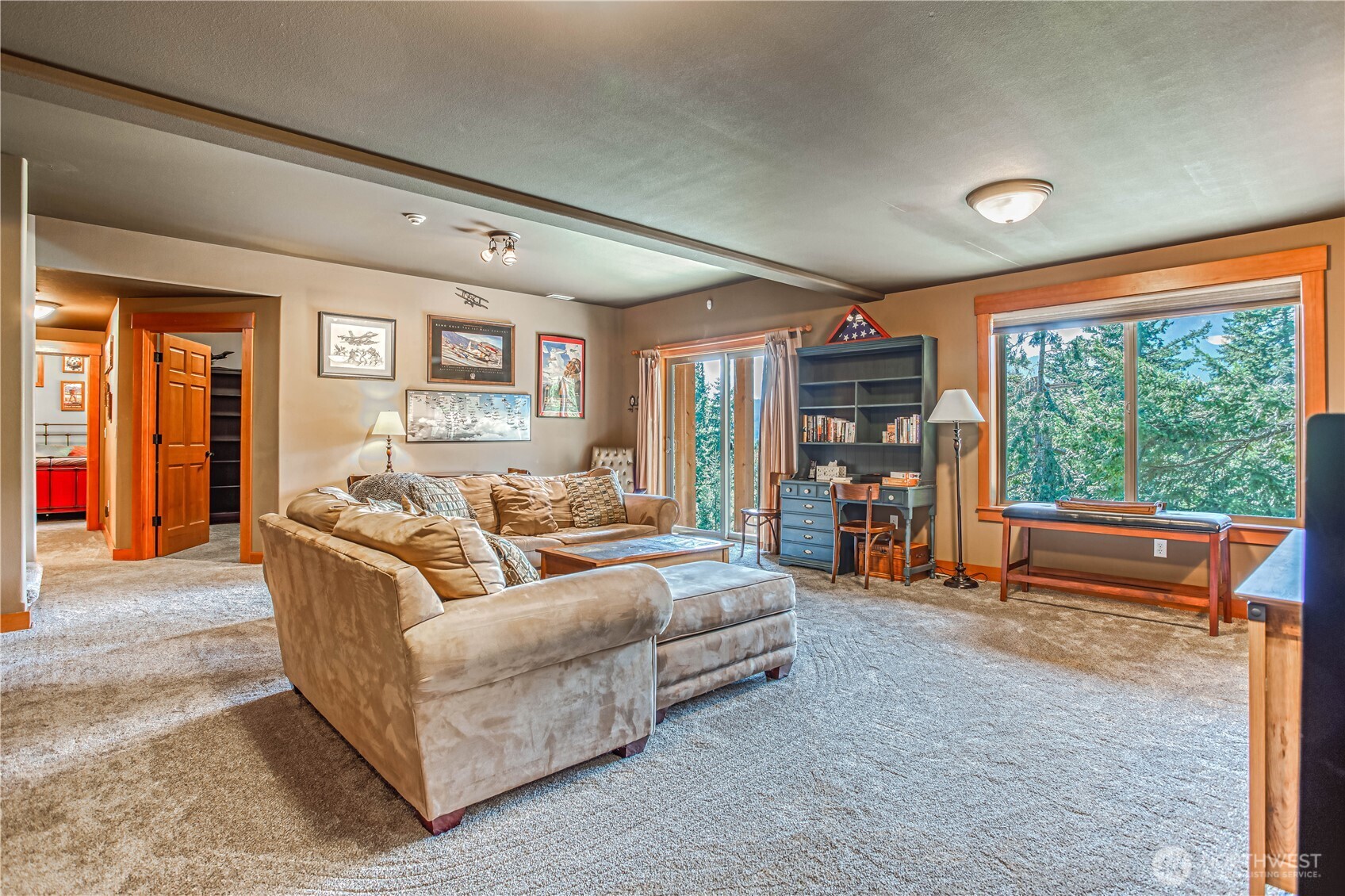 145 Lava Lane Ronald, WA 98940 - Photo 23 of 39 a living room with furniture a ceiling fan and a large window