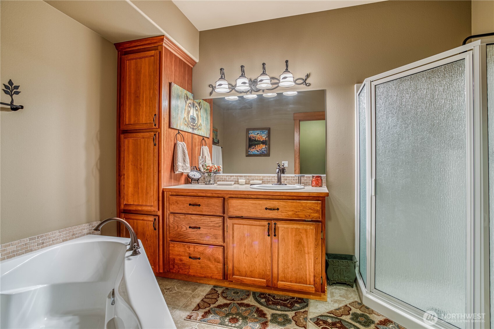 145 Lava Lane Ronald, WA 98940 - Photo 28 of 39 a bathroom with a double vanity sink mirror and bathtub