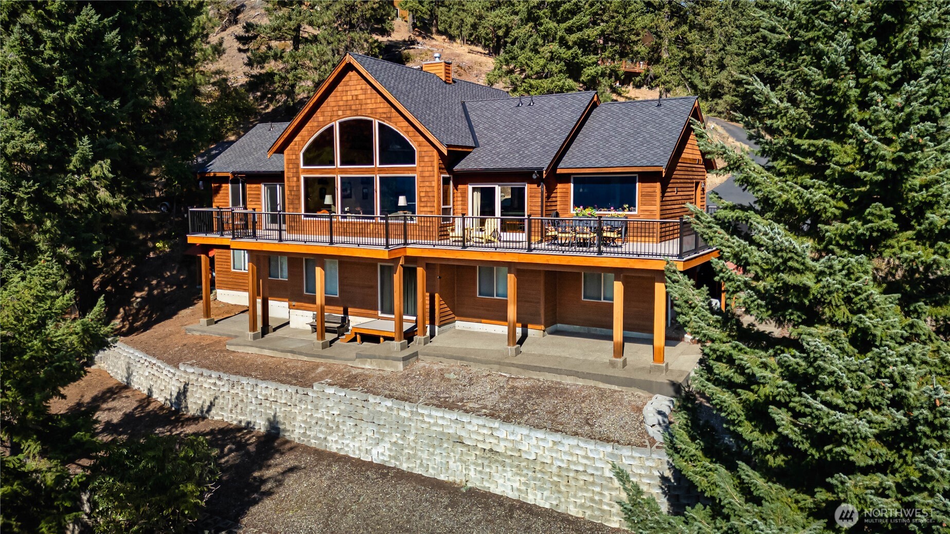 145 Lava Lane Ronald, WA 98940 - Photo 29 of 39 a aerial view of a house with swimming pool and sitting area
