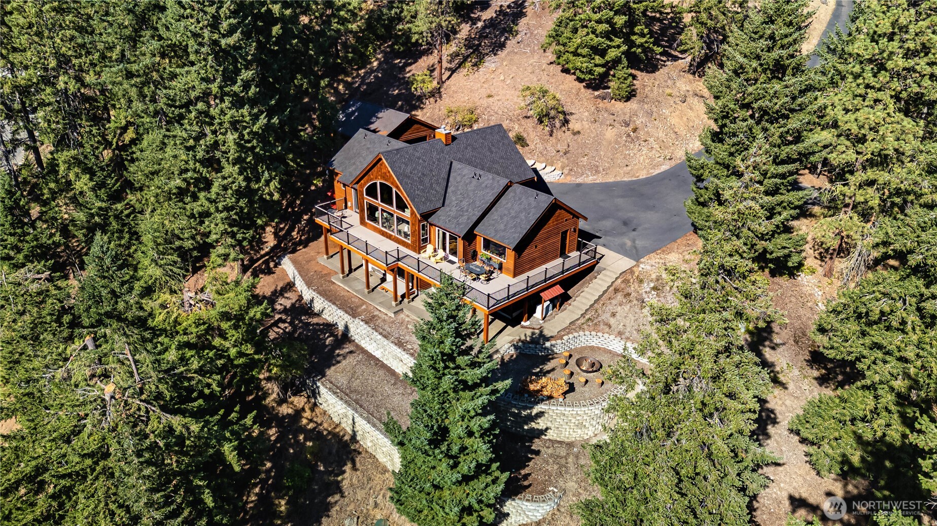 145 Lava Lane Ronald, WA 98940 - Photo 36 of 39 an aerial view of a house with a yard and wooden fence