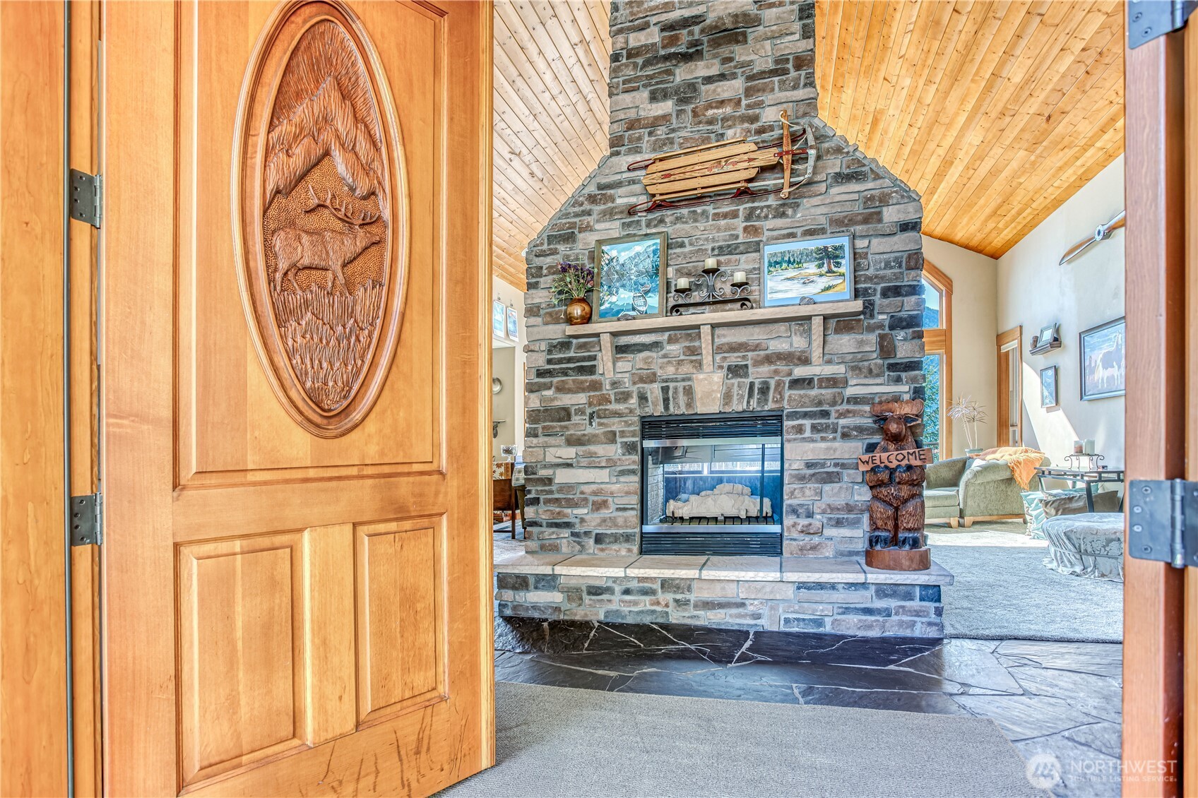 145 Lava Lane Ronald, WA 98940 - Photo 6 of 39 a front view of a building with entryway