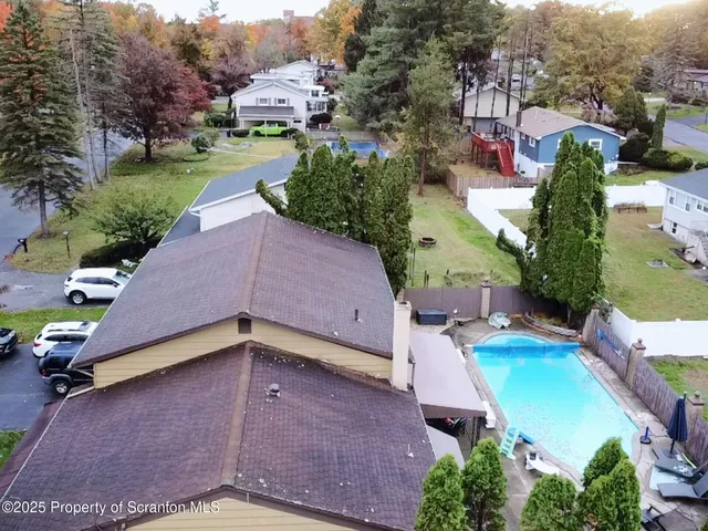 a kitchen with stainless steel appliances a refrigerator sink and cabinets