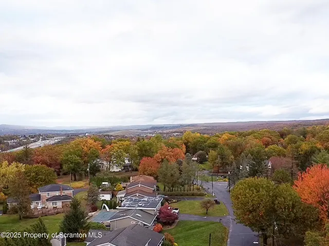 a bathroom with a sink vanity and mirror