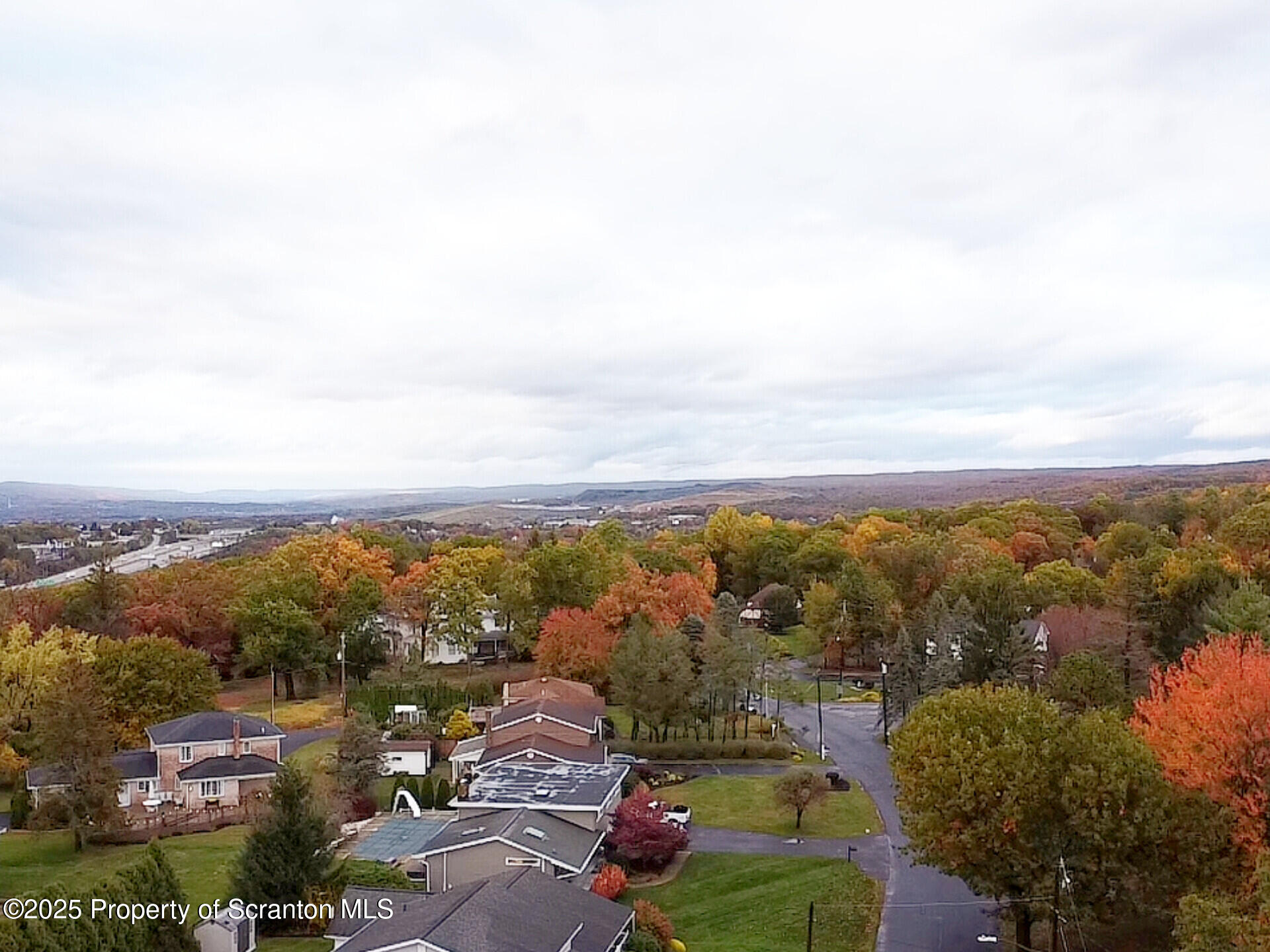 215 Lake Scranton Road Scranton, PA 18505 - Photo 6 of 31 an aerial view of residential building and trees around