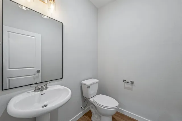a bathroom with a sink and a toilet