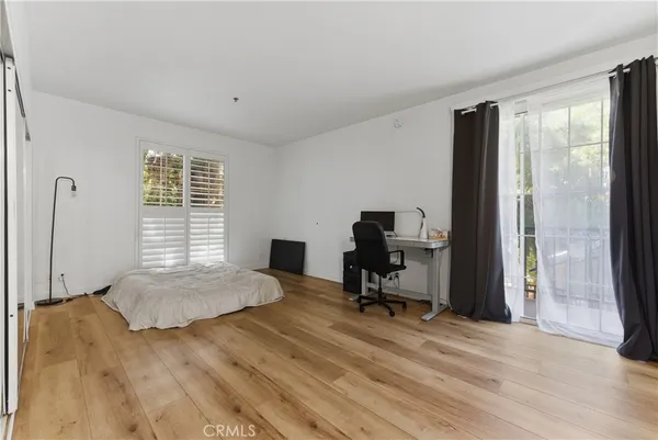 a workspace with furniture and a window