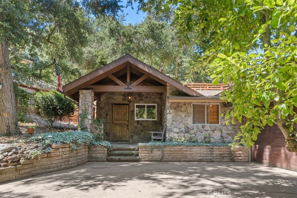 a front view of a house with garage
