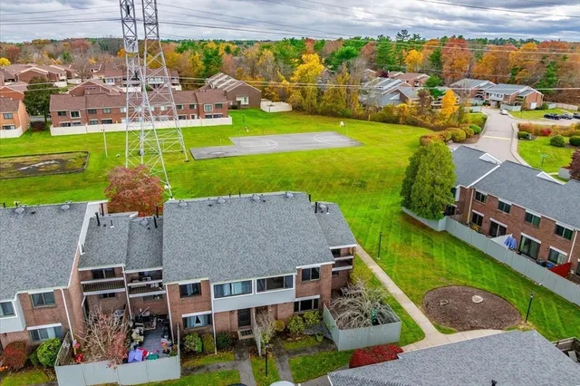 an aerial view of a house with a garden