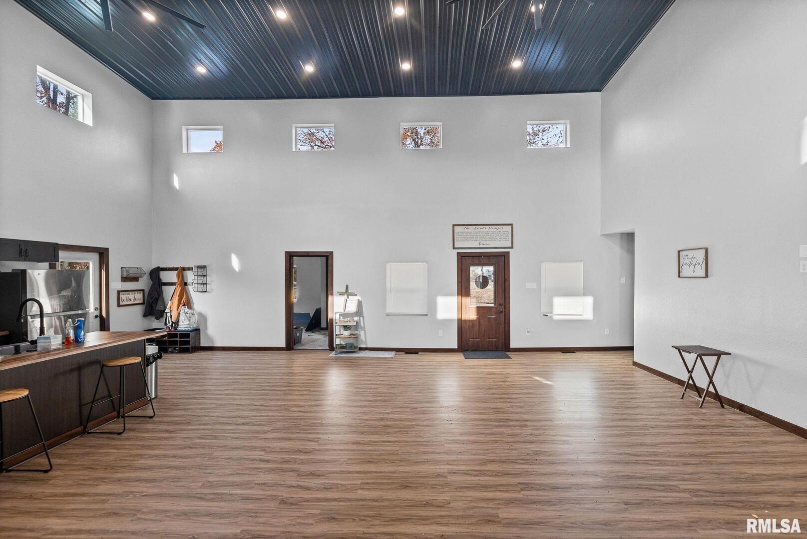 7984 Wilson Road Kinmundy, IL 62854 - Photo 11 of 36 a view of a room with lots of wooden furniture and staircase