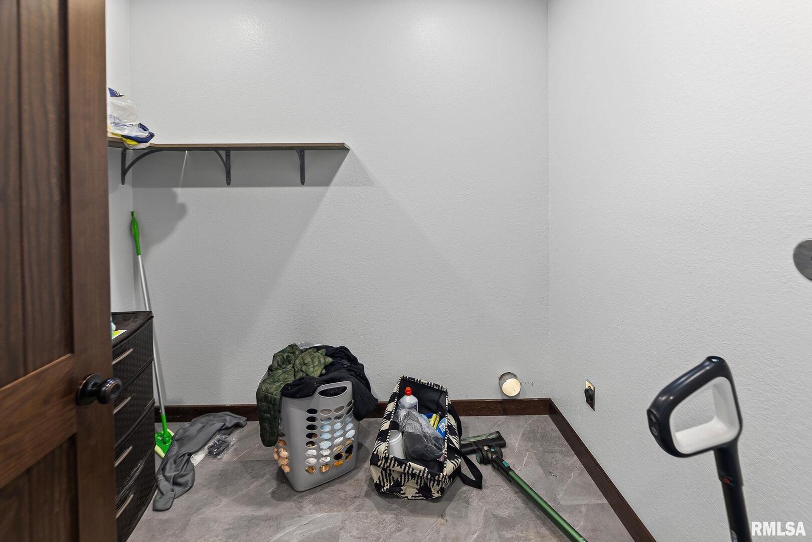 7984 Wilson Road Kinmundy, IL 62854 - Photo 13 of 36 a view of a room with gym equipment