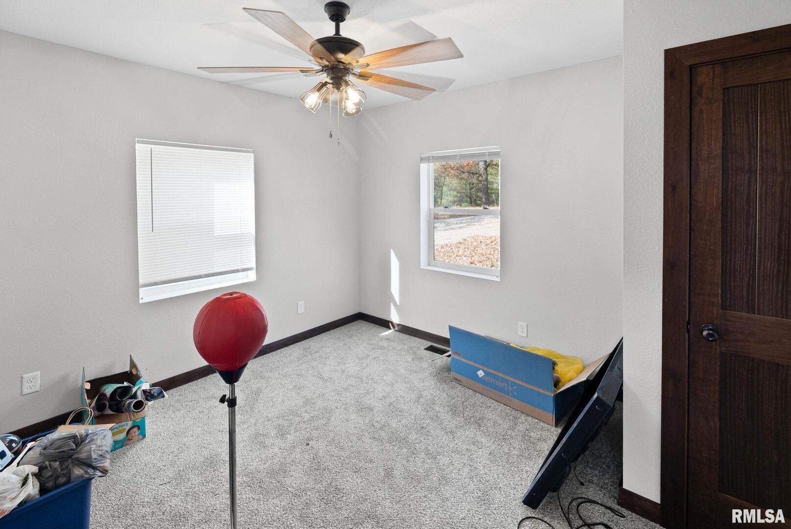 7984 Wilson Road Kinmundy, IL 62854 - Photo 17 of 36 a view of a room with gym equipment