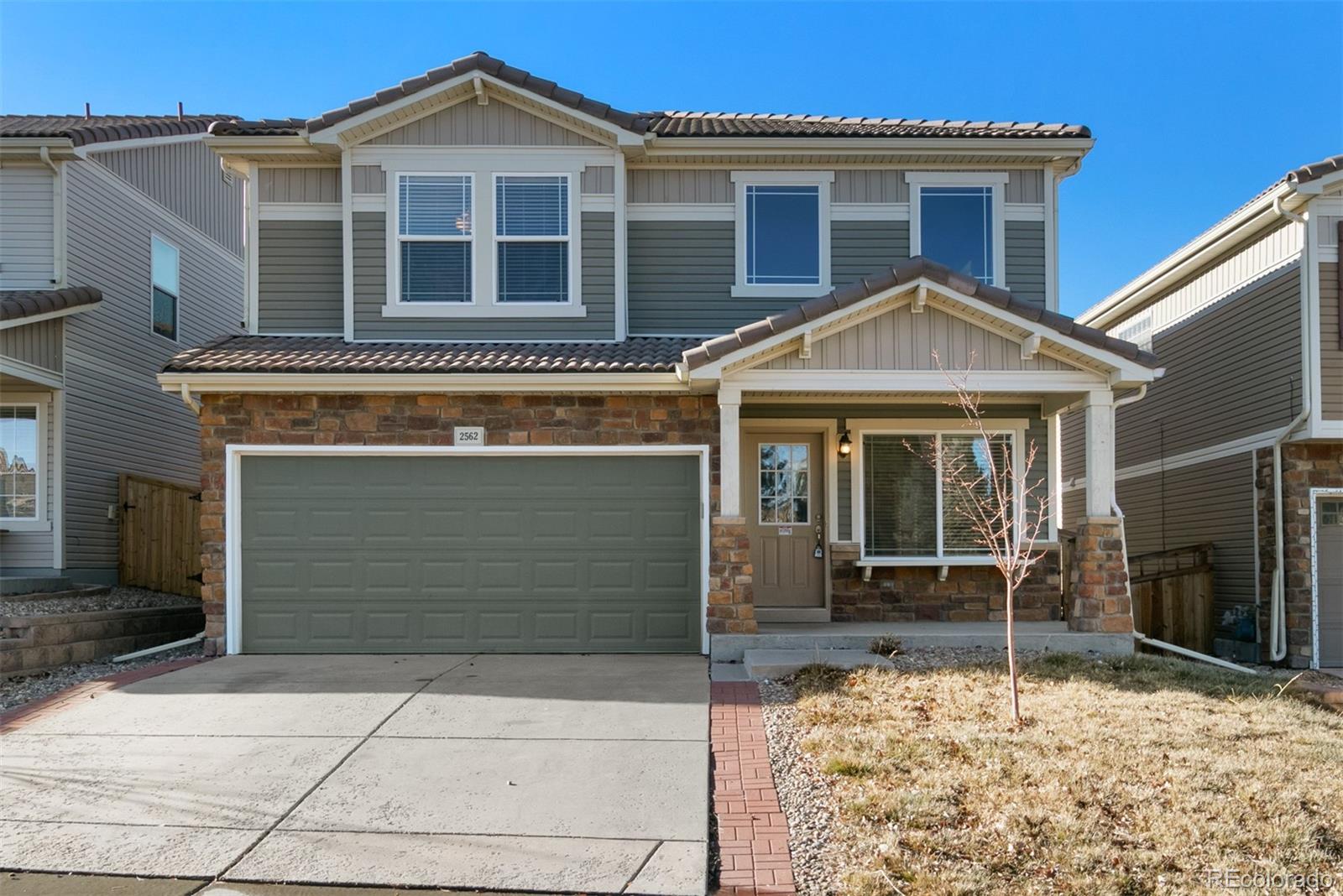 a front view of a house with a porch
