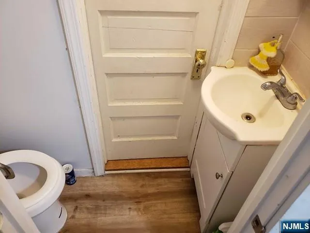 a bathroom with a sink and toilet