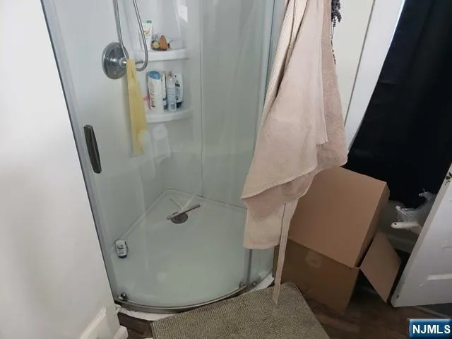 a kitchen with a sink a stove and cabinets