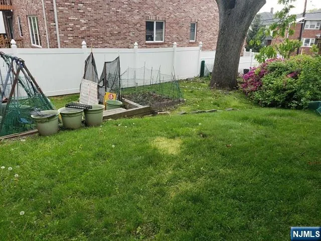 a view of a garden with a bench