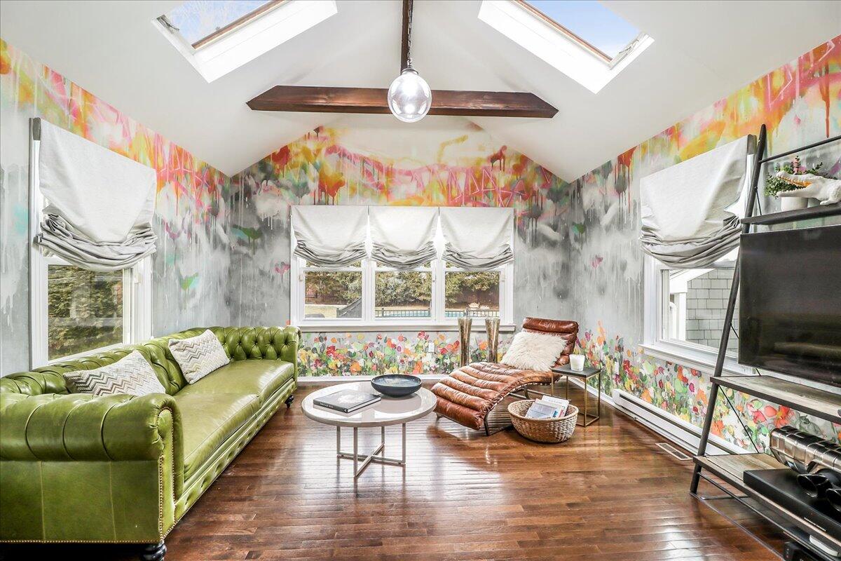 212 West Avenue Darien, CT 06820 - Photo 15 of 40 a living room with furniture and a flat screen tv