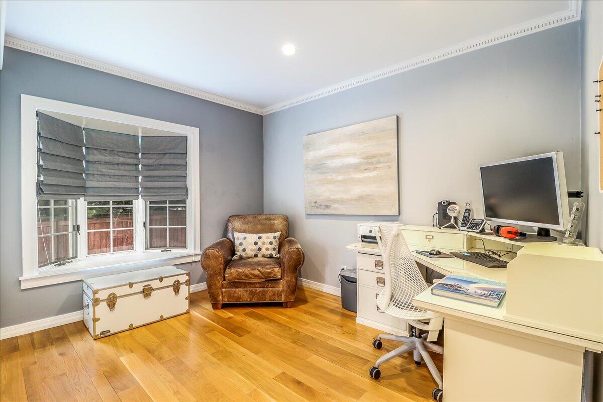 212 West Avenue Darien, CT 06820 - Photo 19 of 40 a work room with furniture a flat screen tv and a window