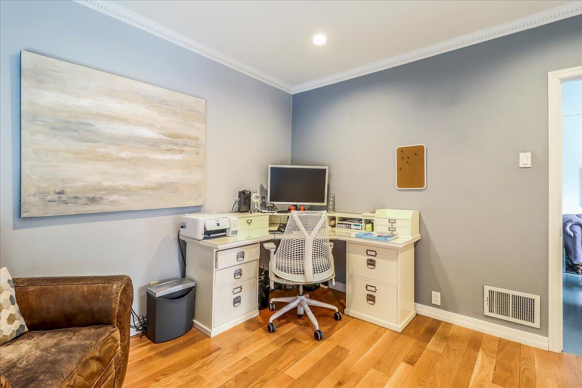 212 West Avenue Darien, CT 06820 - Photo 20 of 40 a view of a livingroom with workspace and a window