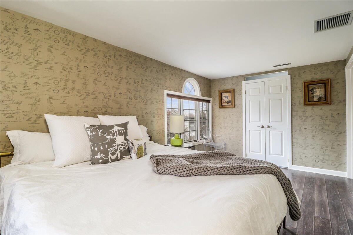 212 West Avenue Darien, CT 06820 - Photo 24 of 40 a bedroom with a bed and a window