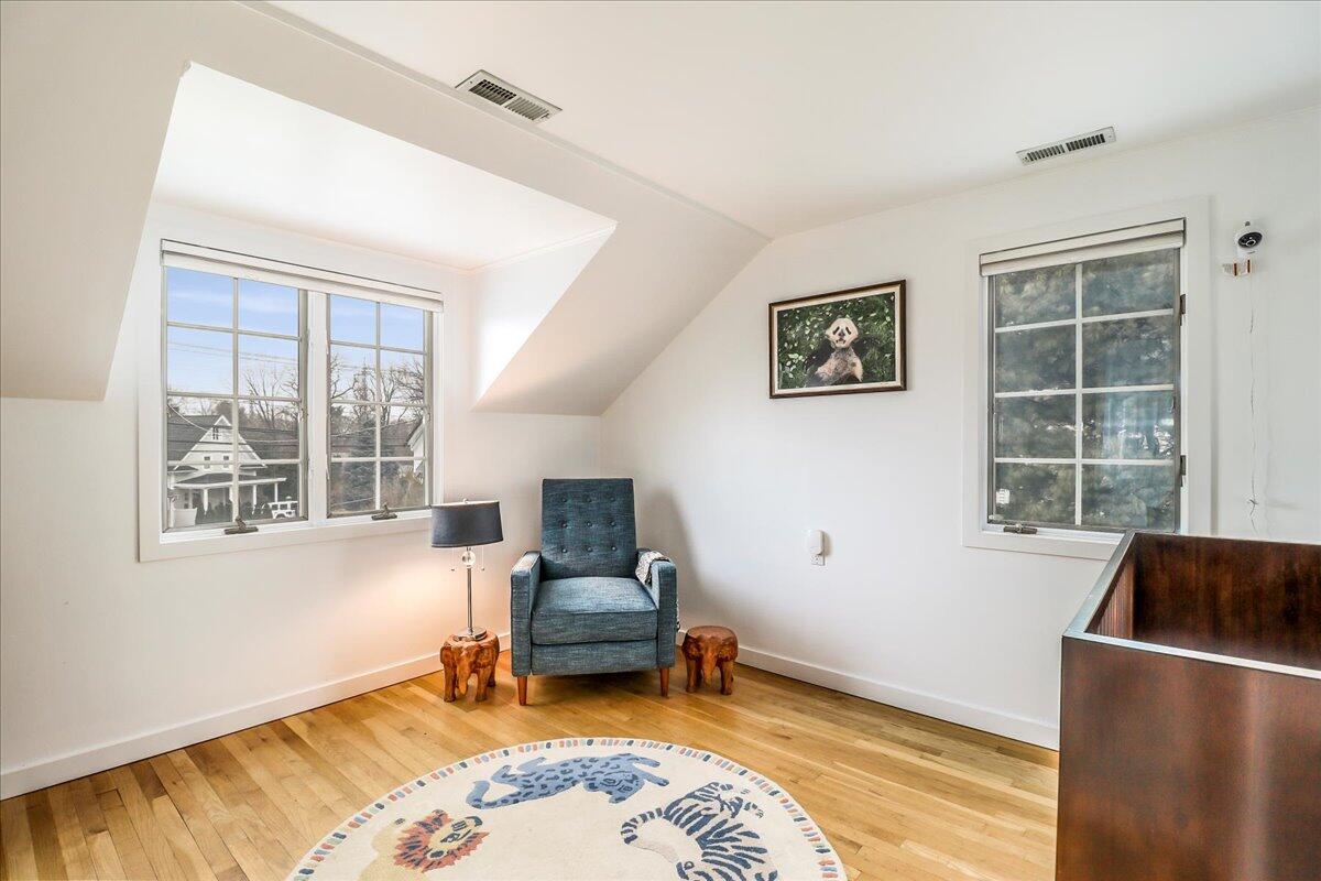 212 West Avenue Darien, CT 06820 - Photo 27 of 40 a living room with furniture and a window