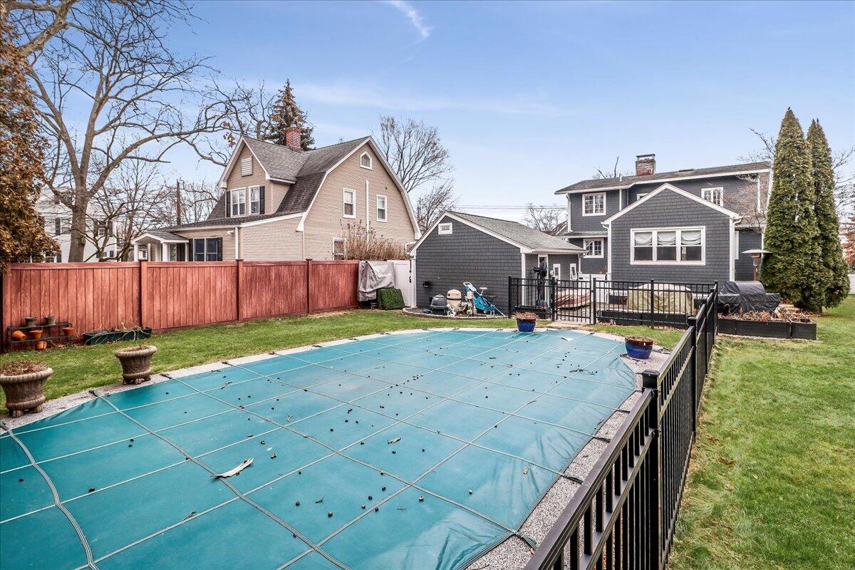 212 West Avenue Darien, CT 06820 - Photo 32 of 40 a view of a house with backyard and sitting area