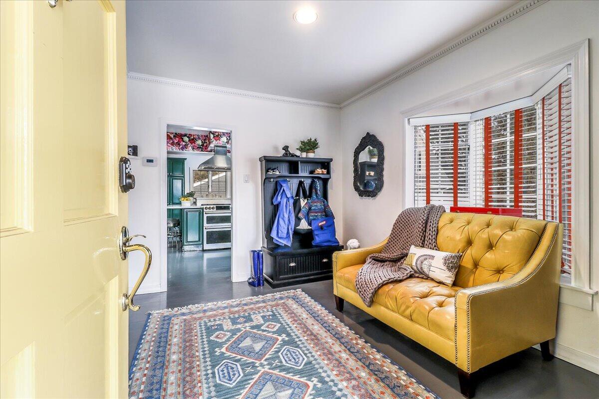 212 West Avenue Darien, CT 06820 - Photo 4 of 40 a living room with furniture and a window