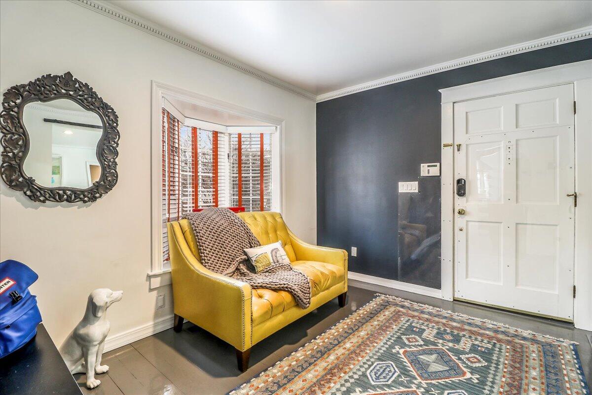 212 West Avenue Darien, CT 06820 - Photo 5 of 40 a bedroom with a bed and a painting on the wall