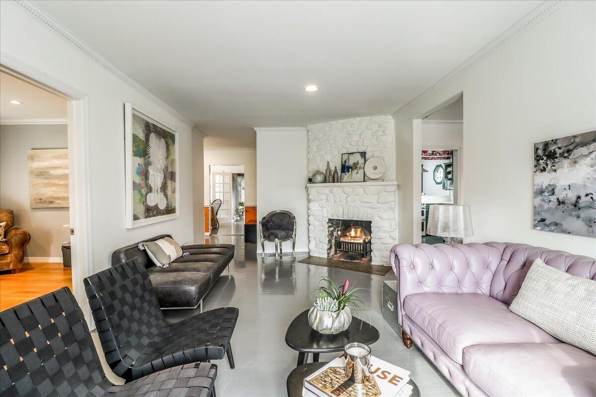 212 West Avenue Darien, CT 06820 - Photo 6 of 40 a living room with furniture fireplace and window