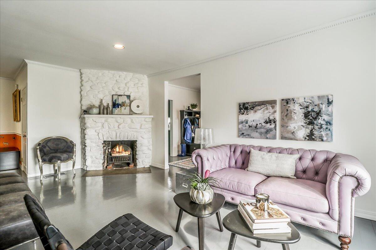 212 West Avenue Darien, CT 06820 - Photo 7 of 40 a living room with furniture and a fireplace