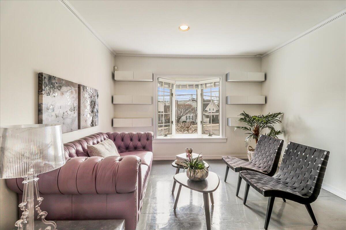 212 West Avenue Darien, CT 06820 - Photo 8 of 40 a living room with furniture and a large window