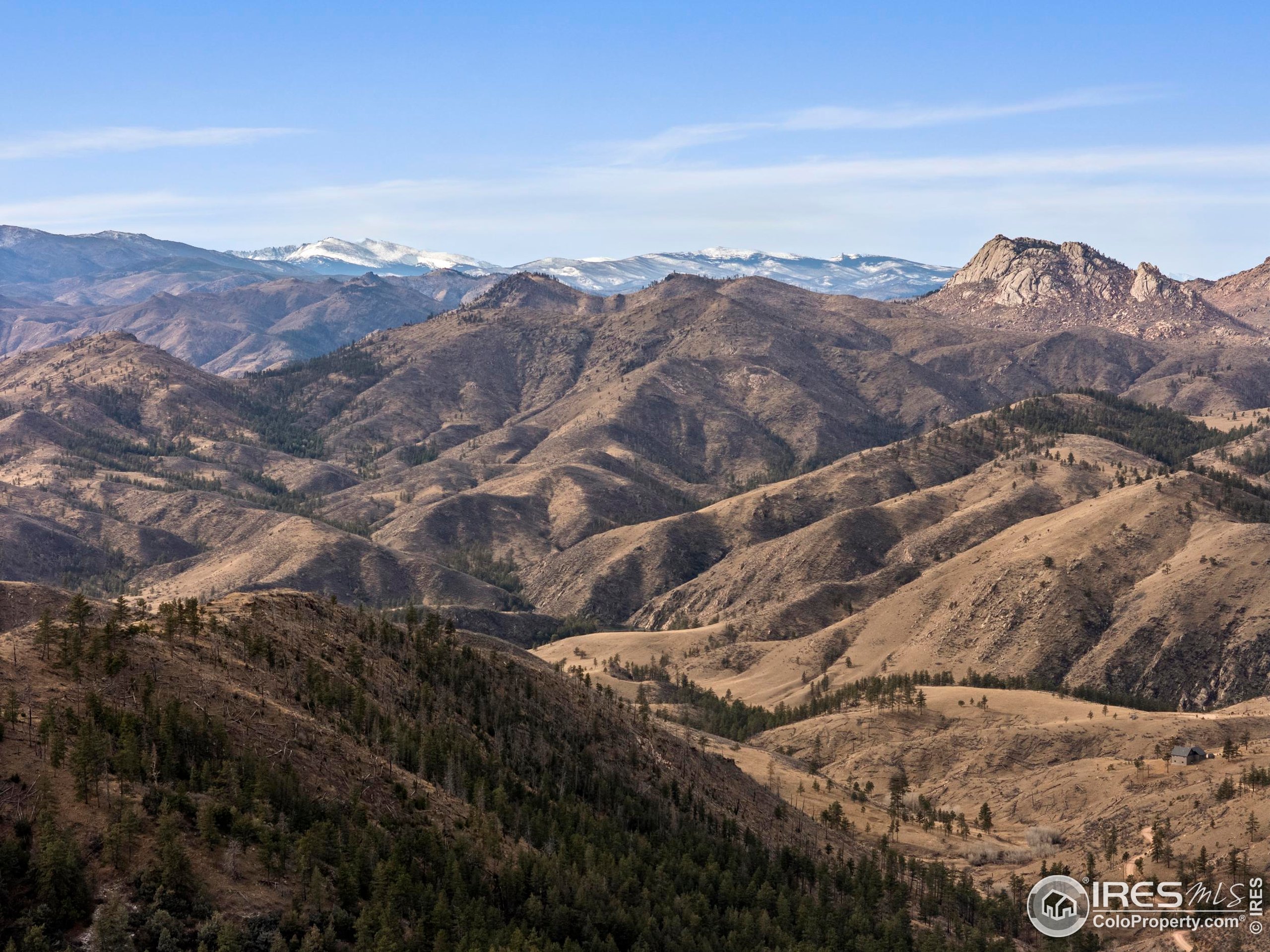 5771 Obenchain Road Laporte, CO 80535 - Photo 24 of 39 a view of a city with mountains in the background