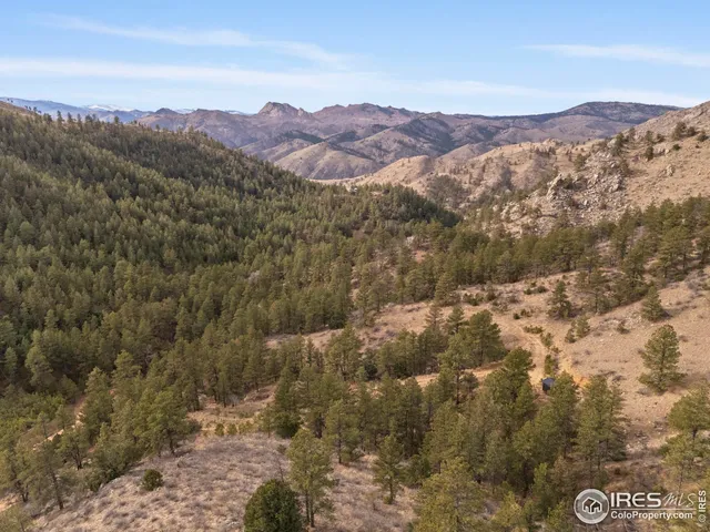 a view of a house with a mountain