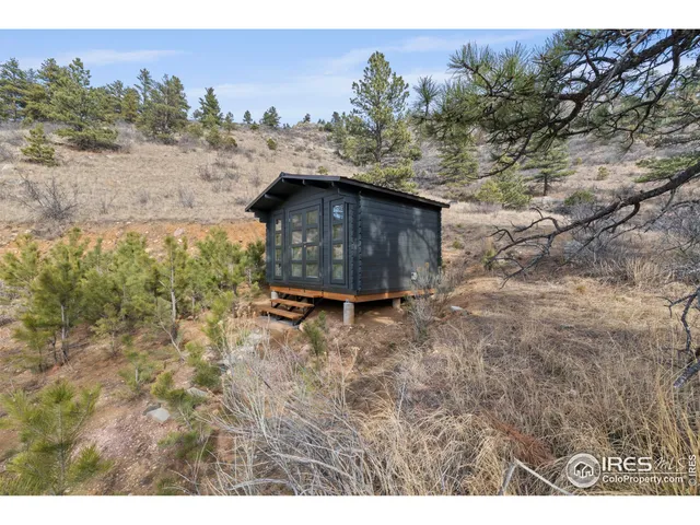 a fire hydrant in the middle of a field