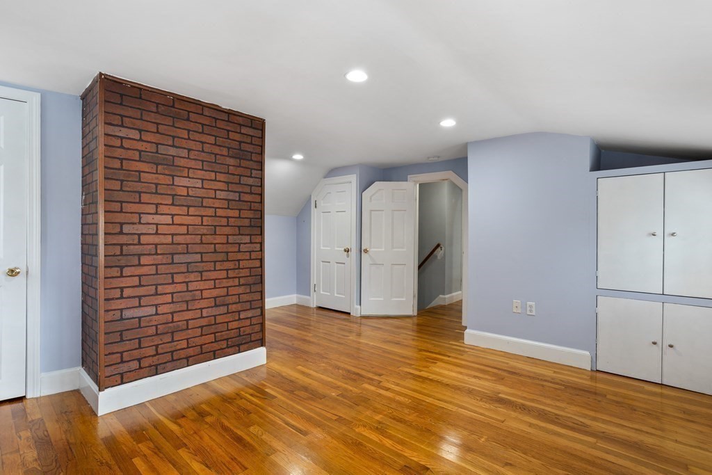 140 Lowell Street Lexington, MA 02420 - Photo 24 of 37 a view of livingroom with an empty space